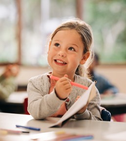 kindergarten girl displays work