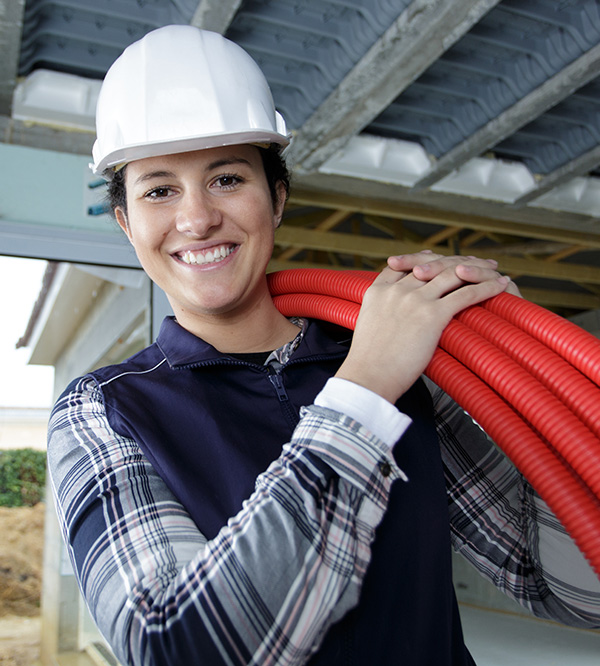 smiling girl with electrical conduit