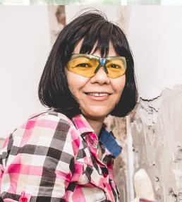 asian lady in protective goggles