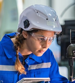 young lady working on equipment